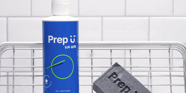 All-natural Prep U soap bottle and bar on a wire rack, promoting hygiene and health.