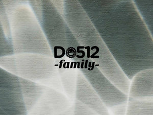 DO512 Family logo displayed on a textured background with light reflections.