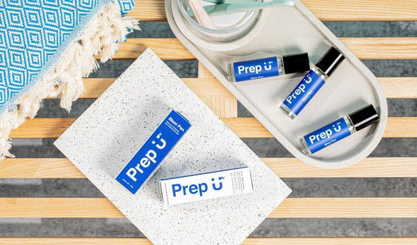Stylish display of Prep U acne treatment products on a wooden tray, perfect for skincare enthusiasts.