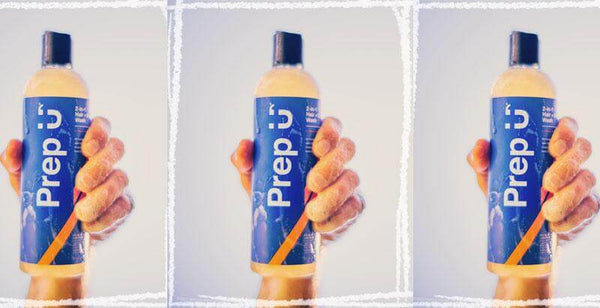 Hand holding Prep U 2-in-1 Hair + Body Wash bottle, winner of Best Hair Care for Him at Eco Excellence Awards 2020.