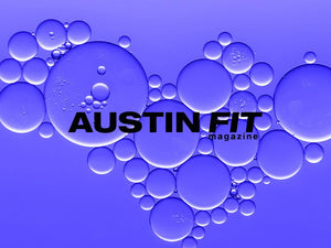 Austin Fit magazine logo with vibrant blue bubbles in a creative design.