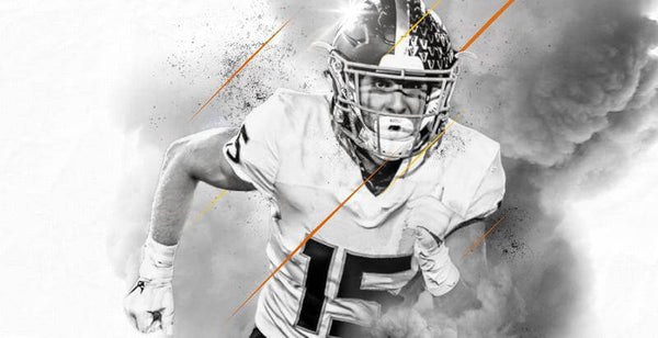 Dynamic football player charging through a cloud of smoke, showcasing strength and intensity on the field.