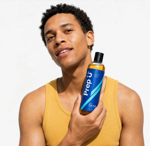 Teen holding Prep U Big Sur Body Wash — included in the Prep U teen hygiene Starter Kit