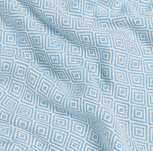 Close-up of blue fabric with a geometric pattern
