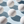 Array of white muscle bath bombs ready to soothe and recharge sore muscles in a relaxing bath.