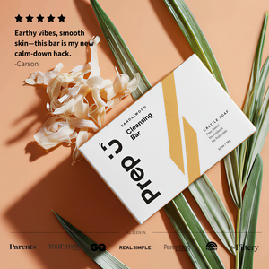 Prep U Cleansing bar on a beige background with plants and flowers
