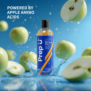 Prep U hair and body wash bottle surrounded by green apples on a blue background