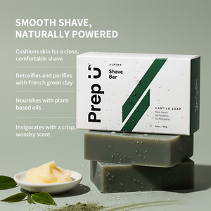 Shave bar packaging with green clay and plant-based oils on a light gray background