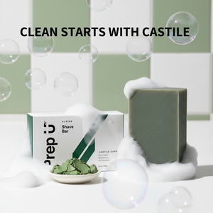Shave soap and Prep U packaging with bubbles and a tiled background.