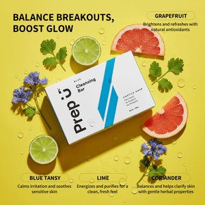 Cleansing bar packaging with grapefruit, lime, and coriander on a yellow background