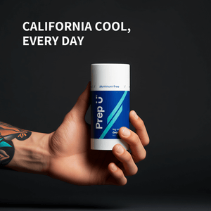 Hand holding a tube of Prep U deodorant with 'California Cool, Every Day' text on a black background
