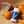 Prep U deodorant stick with oranges on a wooden surface, highlighting ingredient-free benefits.