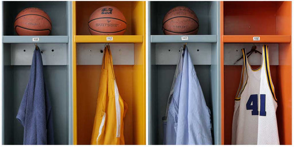 Colorful basketball lockers displaying jerseys and basketballs, showcasing sports team spirit and organization.