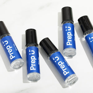 Prep U Blem Pen bottles arranged artistically, featuring all-natural serum for blemishes, perfect for teen acne.